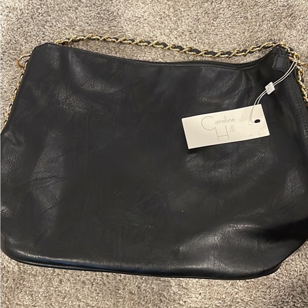 Black purse with gold chain